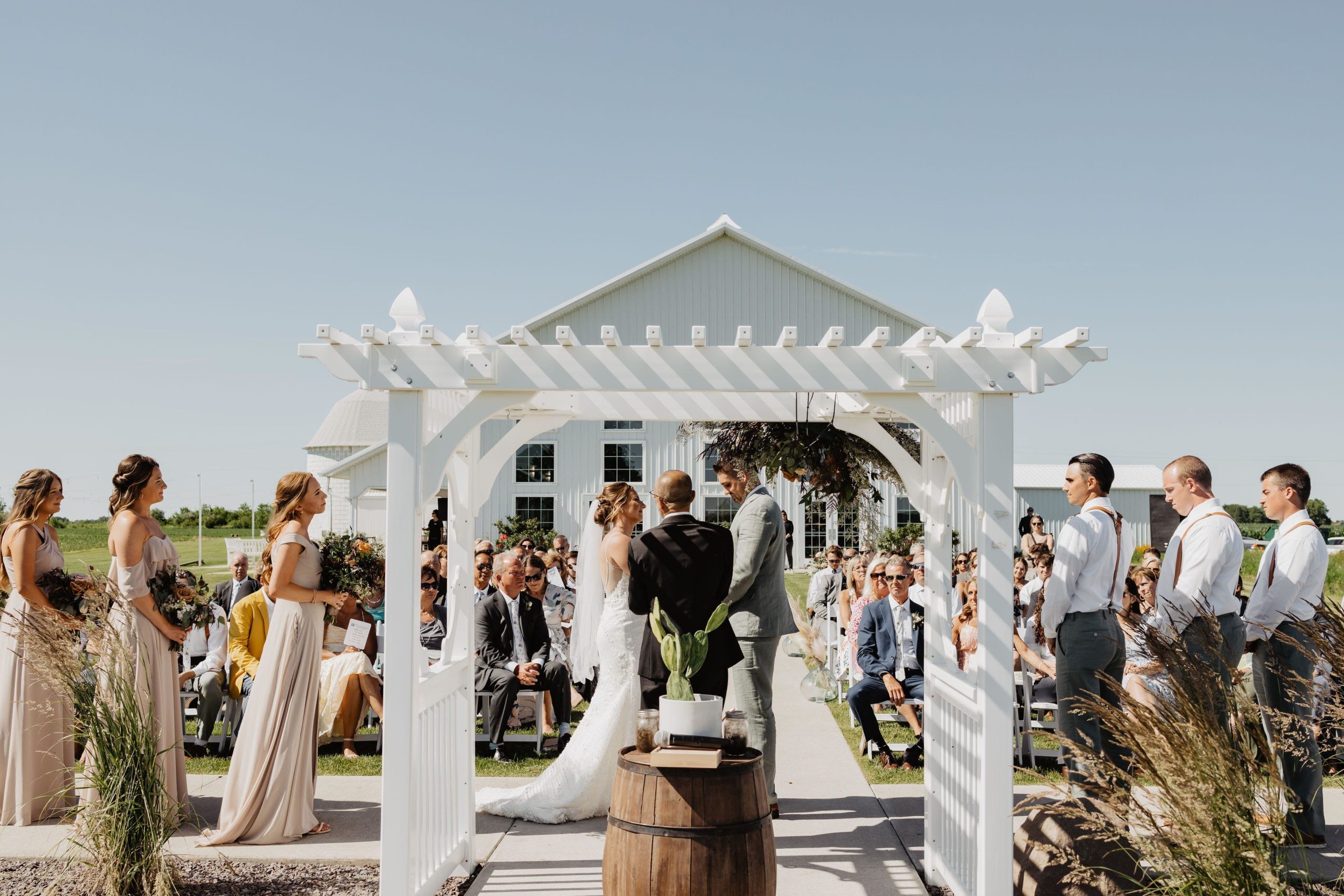 A wedding ceremony at The Barn at Fairview Acres